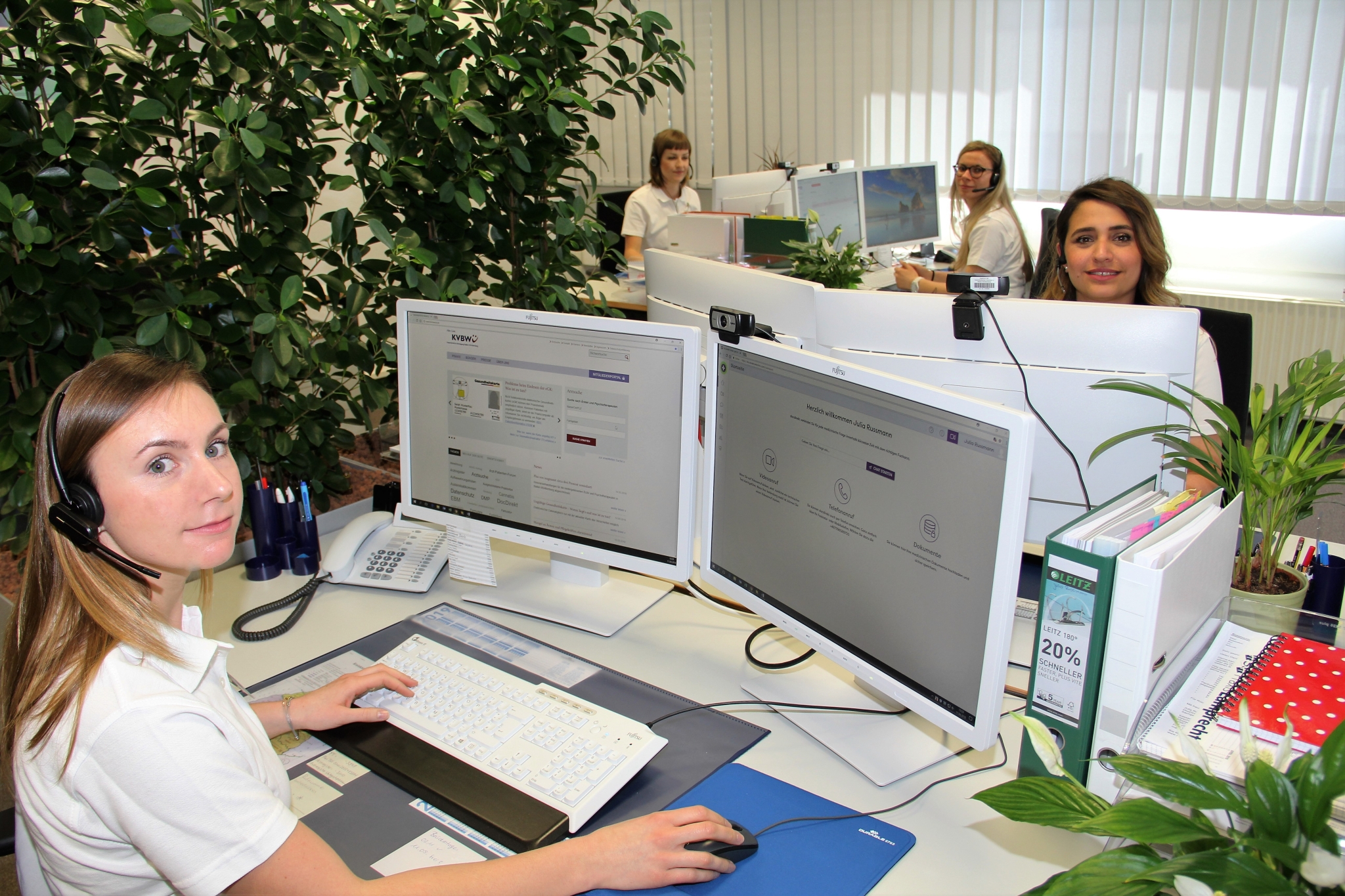 Docdirekt office with the medical assistants sitting in front of their computers.